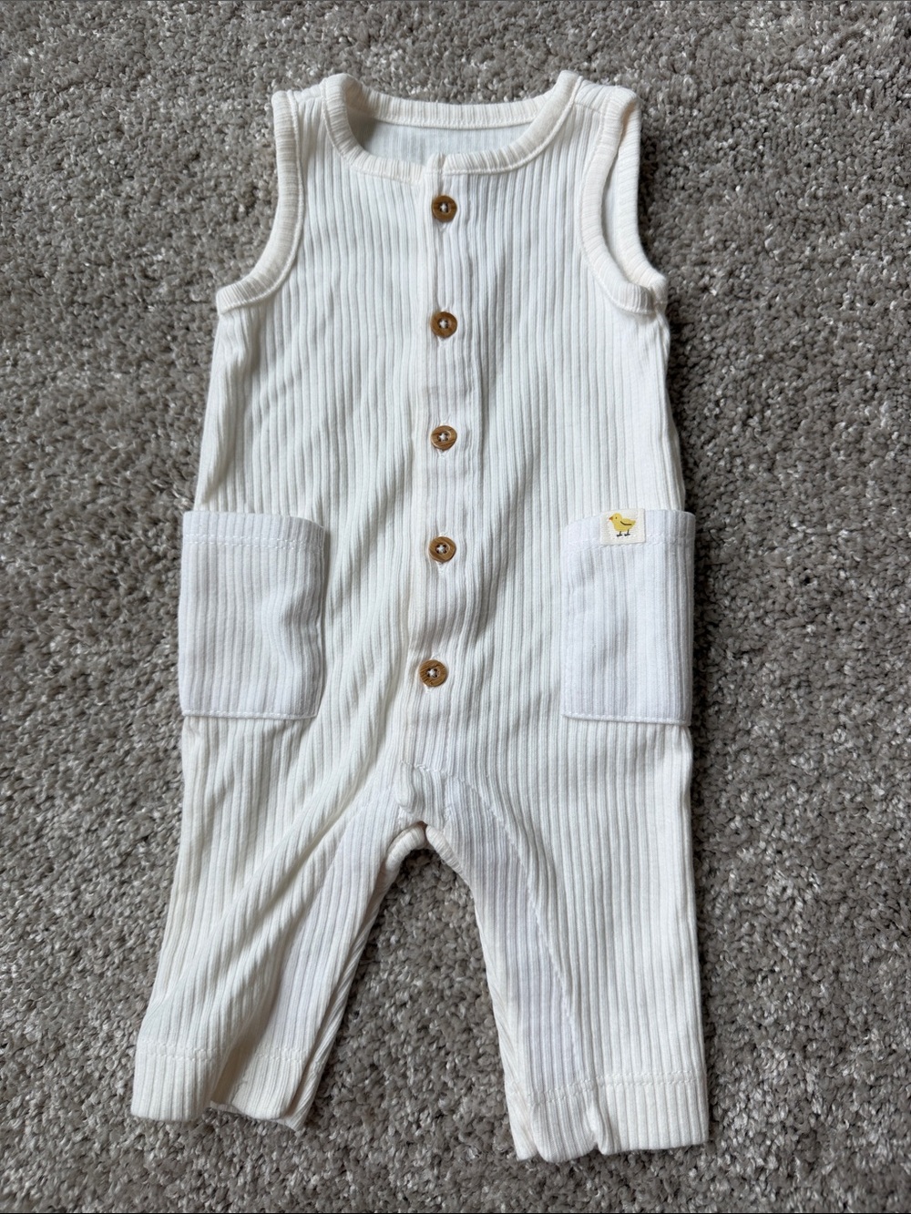 NWOT Carter’s Cream Ribbed Cotton Baby Romper with Front Buttons